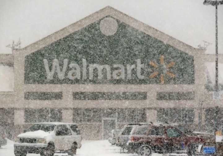 A snowy Walmart storefront